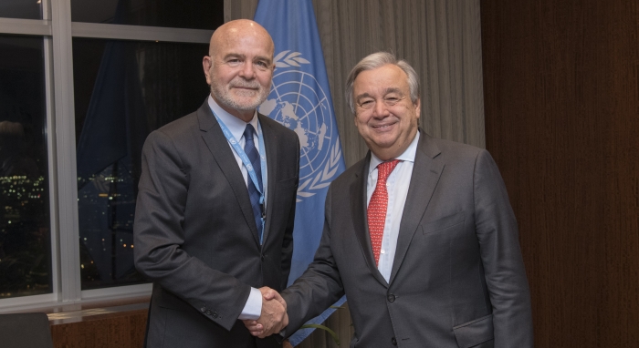 The current Special Rapporteur on human rights defenders shaking hands with the UN Secretary General